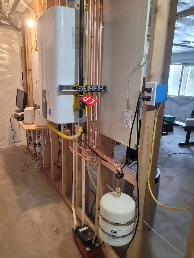 Licensed plumber repairing a kitchen sink in Hamburg